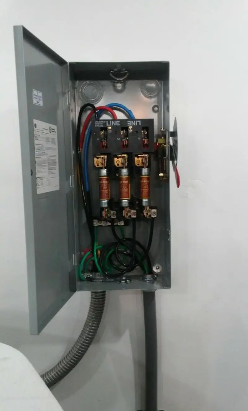 Three-phase disconnect switch installed for Smoke Detector Installation in Gypsum
