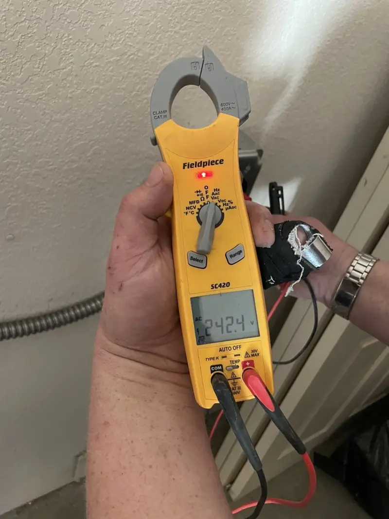 Voltage testing with clamp meter during Generator Installation in Gypsum